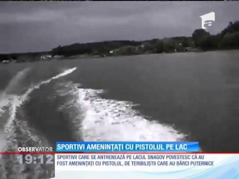 Sportivii care se antrenează pe lacul Snagov, amenințati cu pistolul