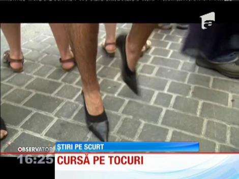 La Madrid, zeci de bărbaţi au alergat pe tocuri