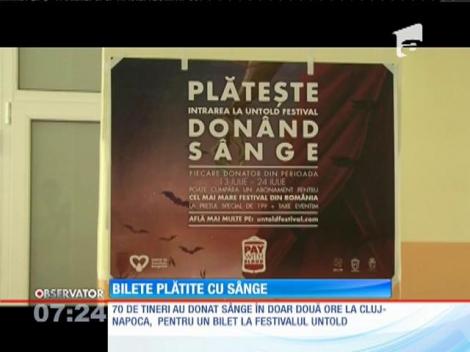 Sute de persoane îşi achită biletul de intrate la festivalul Untold cu sânge