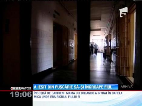 O mamă a ieşit din puşcărie să-şi îngroape fiul