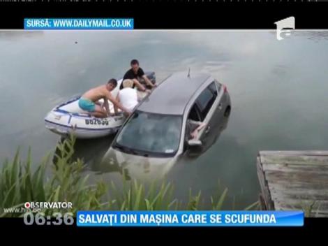 Belgieni salvați din mașina care se scufunda
