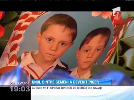 Unul dintre gemenii striviţi de microbuz a fost înmormântat