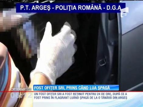Fost ofiţer SRI, prins când lua şpagă