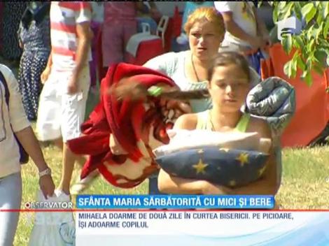 Sfânta Maria, sărbătorită cu manele, mici și bere