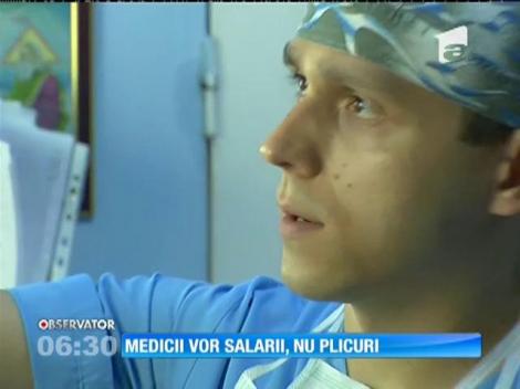 Medicii din România ameninţă cu greva