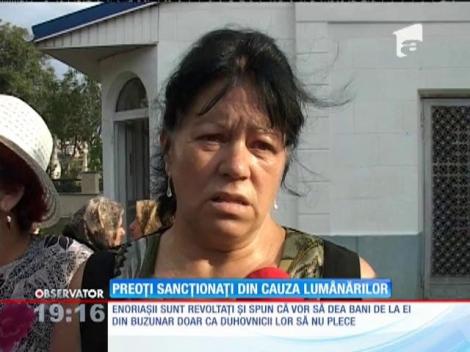 Preot, dat afară din parohie pentru că nu a vândut suficiente lumânări