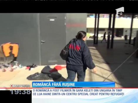 O româncă, filmată în timp ce lua haine destinate refugiaţilor din Budapesta
