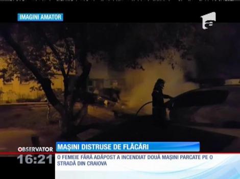 O femeie fără adăpost a incendiat două maşini parcate pe o stradă din Craiova