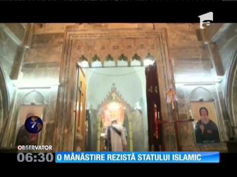 Călugării celei mai vechi mânăstiri creştine din Irak refuză să o părăsească, deşi au ajuns vecini cu Statul Islamic