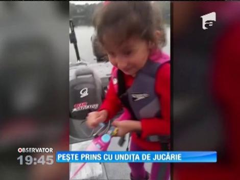 Pește prins cu undița de jucărie, de o puştoaică de numai 4 ani!