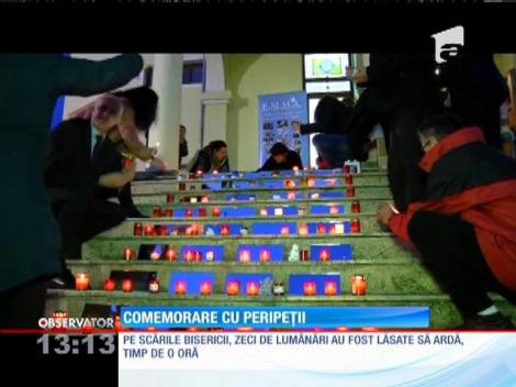 Părul unei femeie a luat foc, la o comemorare a copiilor care au părasit această lume