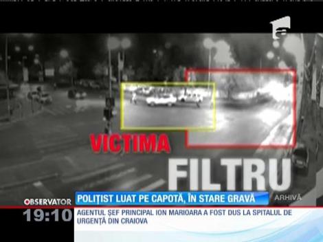 Poliţist din Dolj luat pe capotă, în stare gravă
