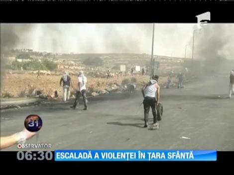 Confruntări violente între israelieni şi palestinieni