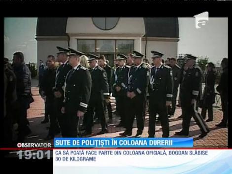 UPDATE! Poliţistul Bogdan Gigină a fost condus pe ultimul drum cu onoruri militare