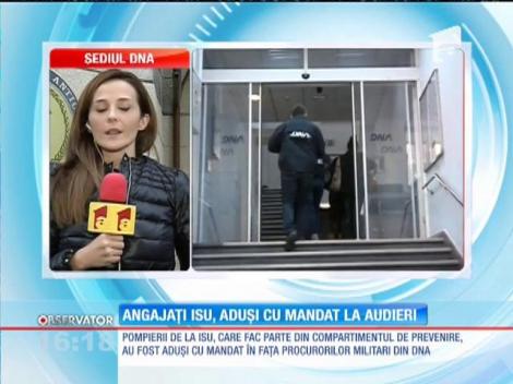 Doi pompieri de la ISU, aduşi cu mandat la audieri