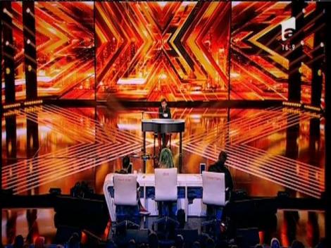 Ed Sheeran - "Thinking out loud". Vezi interpretarea lui Vlad Cearâc, la X Factor!