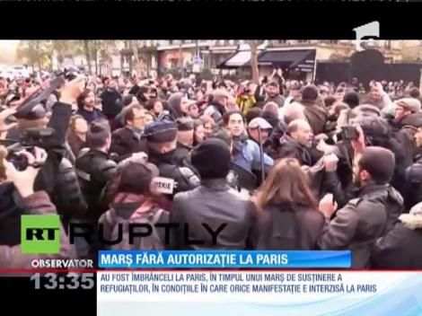 Îmbrânceli la Paris, în timpul unui marş de susţinere a refugiaţilor