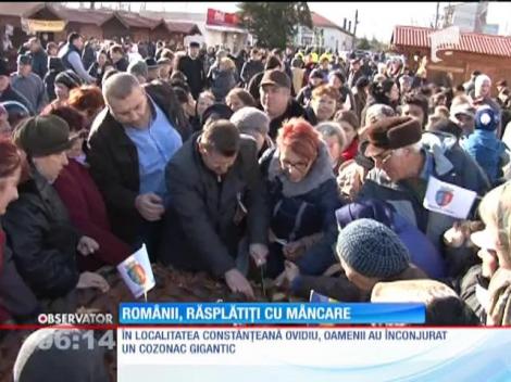 Românii prezenți la parada, răsplătiți cu mâncare