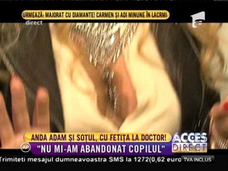 Anda Adam şi soţul, cu fetiţa la medic