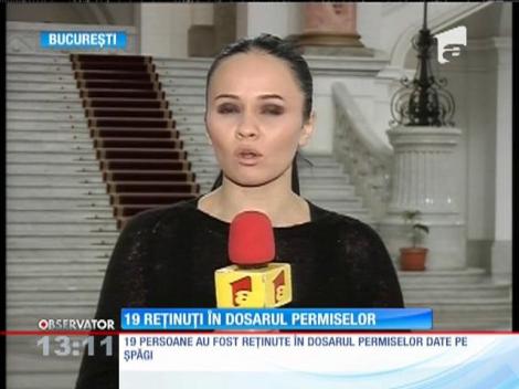 19 persoane, reţinute în dosarul permiselor date pe şpăgi