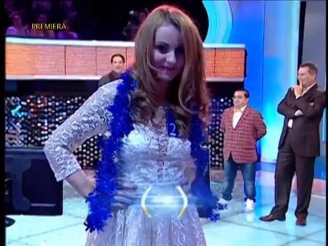 Rândul 4: "Cum se numește pâinișoara rotundă sau în formă de cruce, folosită în ritualul creștin pentru pregătirea împărtășaniei?"?