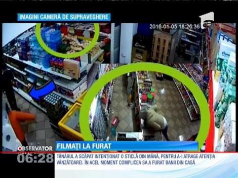 Doi tineri din Găeşti, surprinși de camerele de supraveghere în timp ce jefuiau un magazin