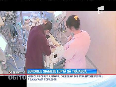 Surorile siameze născute prematur nu renunță la viață