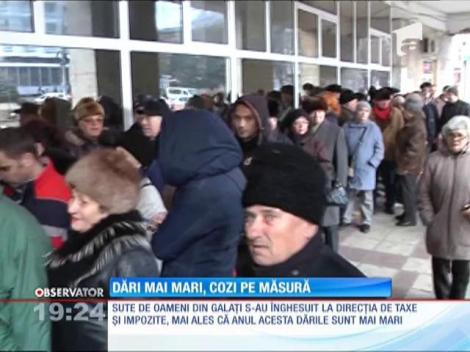 În prima zi dedicată plăţilor de taxe şi impozite, românii s-au grăbit să dea bani la stat