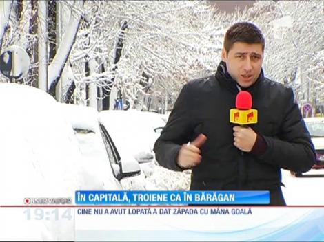 Bucureştenii, rătăciţi în troienele din parcare