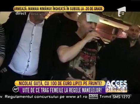 Nicolae Guţă, cu 100 de euro lipiţi pe frunte!
