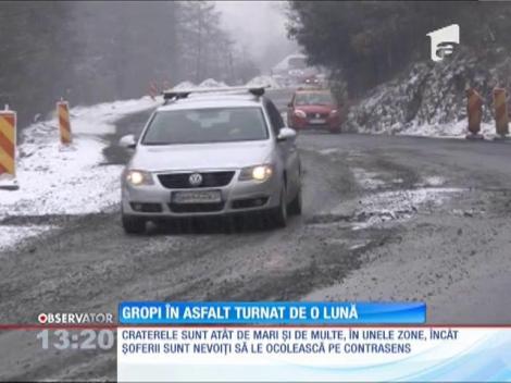 Lucrări de mântuială pe Drumul Naţional 76. Au apărut primele gropi în asfaltul turnat în decembrie