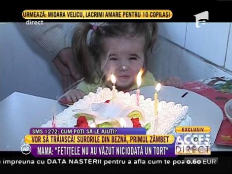 Andreea şi Nicoleta nu au fost niciodată sărbătorite. Iată reacția lor când au gustat pentru prima dată dintr-un tort!