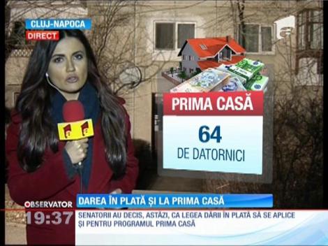 Românii care şi-au luat locuinţe prin programul Prima Casă vor beneficia şi ei de legea dării în plată