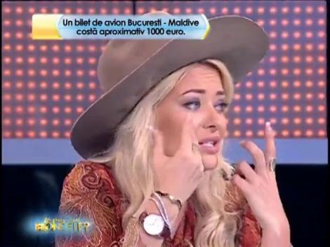 Rândul 7: "Care este arborele naţional al insulelor Maldive, singura sursă de umbră pe plajele cu nisip alb şi fin"?