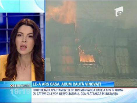 Proprietarii apartamentelor din mansarda mistuită de incendiu caută vinovaţii