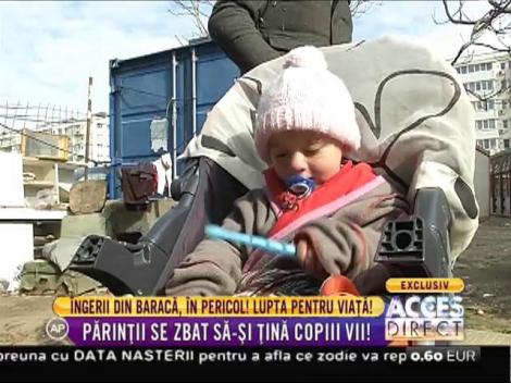 Copiii din baracă, în pericol! Părinții lor nu pot face mai mult pentru cei mici