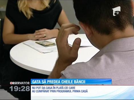 Mii de români cu credite în franci elveţieni, gata să predea cheile de la case