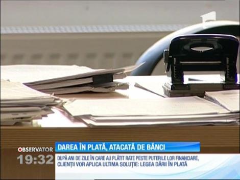 Darea în plată, atacată de bănci