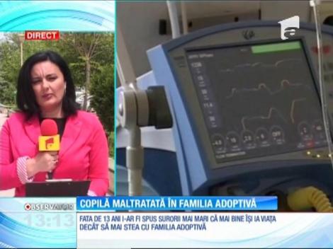 O fată de 13 ani, arsă pe mâini, bătută şi jignită de membrii familiei adoptive