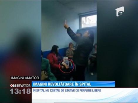 O pacientă a Spitalului Judeţean Argeş a fost filmată în timp ce aparţinătorul îi ţinea perfuzia