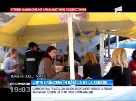 Lupte corp la corp între comercianți și jandarmi