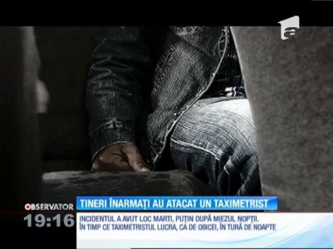 Taximetrist tâlhărit, bătut şi ameninţat cu o armă