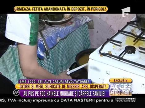Elena Merișoreanu și Daniela Gyorfi, sufocate de mizerie! Au pus pe foc hainele murdare ale unei familii sărace din județul Prahova