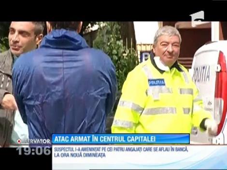 Atac armat la o bancă din centrul Capitalei! A fugit înainte să vină poliţiştii