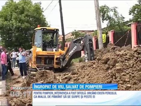 Îngropat de viu, salvat de pompieri