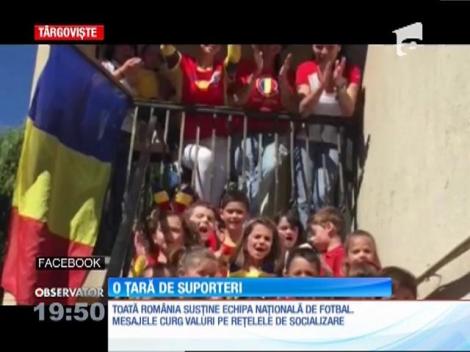 O ţară de suporteri! Un singur mesaj răzbate din piepturile lor: "Hai, România!"