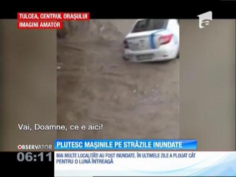 Centrul oraşului Tulcea, complet închis. Plutesc mașinile pe străzile inundate!