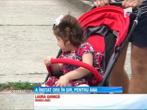 Un sportiv din Petroșani a înotat în râul Jiu pentru o Ana, o fetiță care suferă de o malformaţie a coloanei vertebrale