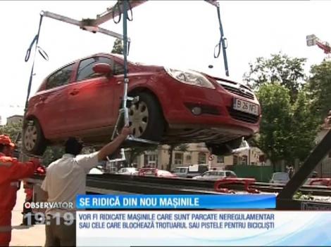 Guvernul a pregătit un proiect prin care mașinile parcate neregulamentar să poată fi ridicate