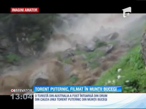 Un torent ca o cascadă a fost filmat în Munţii Bucegi